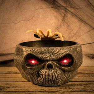 Halloween candy skull bowl with movable skeleton hand