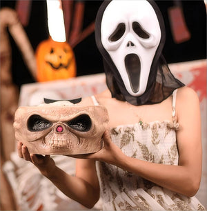 Halloween candy skull bowl with movable skeleton hand